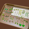Green Cat Eye Stone Flower Silver Needle Earrings Anti Loss Ginkgo Bamboo Four Petal Ear Cuff view 1