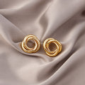 Elegant Gold Alloy Twisted Knot Hollow Geometric Studs, Polished Braided Hoop Statement Earrings view 2