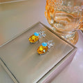 Luxury Yellow Crystal Flower Geometric Studs With Silver Needle And Blue Enamel Floral Accent Earrings view 3