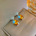 Luxury Yellow Crystal Flower Geometric Studs With Silver Needle And Blue Enamel Floral Accent Earrings view 1