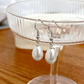 Elegant Korean Minimalist Teardrop Pearl Alloy Hook Dangle Earrings For Women Small Chic Tassel Earrings view 3