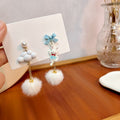 Cute Cartoon Bunny Cloud Asymmetric Chain Pearl Enamel Bow Fluffy Pom Pom Drop Earrings view 4