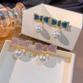 Elegant Korean Style Rhinestone Bowknot Pearl Drop Stud Earrings For Women Luxury Alloy Silver Needle Earrings view 1