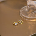 Elegant French Gold Alloy Huggie Hoop With Oval Zircon Crystal Charm Light Luxury Stud Earrings view 4