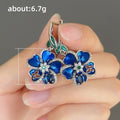 Blue Enamel Butterfly Flower Drop Earrings With Resin Petals And Rhinestone Ear Cuffs view 4