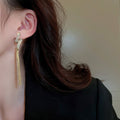 Light Luxury Geometric Twisted Rhinestone Long Tassel Metal Drop Earrings view 4