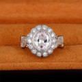 Luxury Full Rhinestone Copper Plated Round Cubic Zirconia Openwork Ring For Women view 3