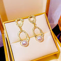 Vintage Baroque Irregular Geometric Hollow Gold Alloy Natural Pearl Luxury Drop Dangle Earrings view 1