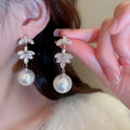 French Light Luxury Pearl Heart Zircon Flower Snowflake Stud Earrings With Silver Needle view 2