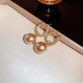 French Light Luxury Alloy Large Pearl Hoop Earrings Vintage Statement Influencer Style view 4