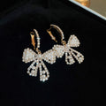 Alloy Bow Pearl Hoop Earrings With Rhinestone Accents French Light Luxury Trendy Style view 4