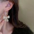 Alloy Bow Pearl Hoop Earrings With Rhinestone Accents French Light Luxury Trendy Style view 3