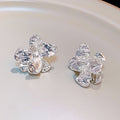 Elegant Liquid Irregular Flower Crystal Rhinestone Studs Light Luxury 3D Floral Silver Needle Earrings view 3