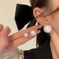Korean Style Round Pearl Stud Earrings With Silver Needle Geometric Light Luxury Fashion Design view 3