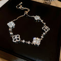 Korean Light Luxury Copper Four Petal Flower Zircon Adjustable Bangle For Women view 1