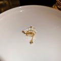 Gold Plated Copper Hollow Heart Zircon Pearl Chain Tassel Clip-on Earrings For Women view 4