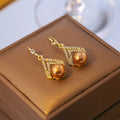 Elegant Champagne Pearl Geometric Teardrop Rhinestone Gold Alloy Dangle Earrings for Women Luxury Earrings view 3