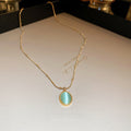 Light Luxury Stainless Steel Oval Cat Eye Stone Beaded Collarbone Necklace view 1