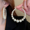 Oversized Pearl Hoop Earrings With Silver Pins French Chic Geometric Statement Design view 3