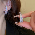 Chic Gold Plated Copper Curved Line Zircon Drop Earrings With Silver Posts For Women view 3