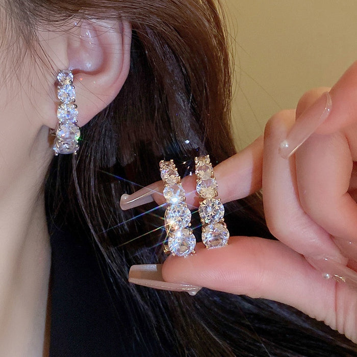 Chic Gold Plated Copper Curved Line Zircon Drop Earrings With Silver Posts For Women