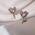 Elegant Molten Alloy Heart Studs With Pink Crystal Rhinestone Drip Design For Women Fashion Earrings view 1