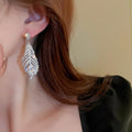 Copper Zircon Teardrop Feather Stud Earrings For Women Light Luxury Statement Jewelry view 3