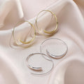 Elegant Alloy Oval Spiral Hoop Earrings For Women Minimalist Geometric Metal Wire Loop Earrings view 1