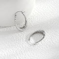 Light Luxury Silver Tone Alloy Wrinkled Textured Hoop Earrings For Women Elegant Minimalist Niche Earrings view 4