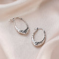 Light Luxury Silver Tone Alloy Wrinkled Textured Hoop Earrings For Women Elegant Minimalist Niche Earrings view 3