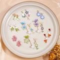 Silver Needle Cartoon Enamel Tassel Stud Earrings Bow Flower Letter Popcorn Alloy Drops view 1