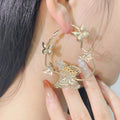Elegant Gold Alloy Hollow Butterfly Hoop Earrings, Fashion Geometric Floral Metal Circle Earrings view 3