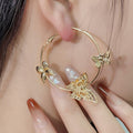 Elegant Gold Alloy Hollow Butterfly Hoop Earrings, Fashion Geometric Floral Metal Circle Earrings view 4