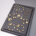 Elegant Gold Alloy Hollow Butterfly Hoop Earrings, Fashion Geometric Floral Metal Circle Earrings view 1