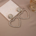 Luxury Rhinestone Hollow Heart Drop Earrings With Pearl Alloy Studs Elegant Statement Earrings view 4