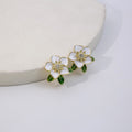 Elegant White Enamel Camellia Flower Studs With Green Leaves And Rhinestone Center Alloy Earrings view 4