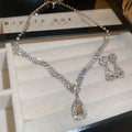 Light Luxury Metal Rhinestone Teardrop V Tassel Necklace With Drop Earrings view 3