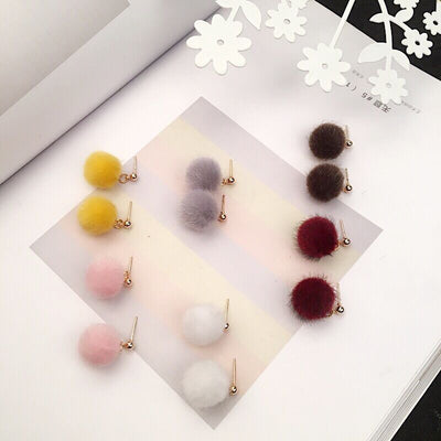 Primary supplied view of soft pom-pom stud earrings