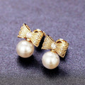 Cute Statement Pearl Bow Stud Earrings Korean Elegant Celebrity Style Fashion Earrings For Women view 4