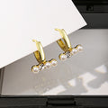 Light Luxury Geometric Heart Pearl Earrings For Women Irregular Metal Hollow Rhinestone Ear Cuffs view 2