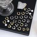 Light Luxury Geometric Heart Pearl Earrings For Women Irregular Metal Hollow Rhinestone Ear Cuffs view 1