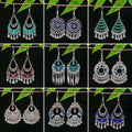 Vintage Ethnic Miao Silver Plated Alloy Earrings With Geometric Waterdrop Bell Tassel Hollow Design view 1