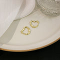 Elegant Irregular Metal Hollow Heart Stud Earrings For Women Two Tone Gold Silver Alloy Minimalist Earrings view 2