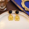 Vintage Palace Style Gold Alloy Lion Totem Drop Studs With Black Flower Acrylic Tops For Women Earrings view 1