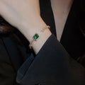 Light Luxury Copper Open Bangle With Square Emerald Green Zircon Ring Design view 3