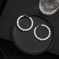 Elegant Twisted Pearl Hoop Earrings Geometric Round Alloy Wire Circle Statement Fashion Earrings view 4