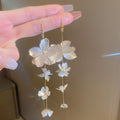 Light Luxury Metal Flower Long Tassel Ear Hook Drop Earrings, Statement Floral Design view 1