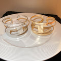 Minimalist Cold Style Double Layer Hollow Metal Wide Cuff Bangle for Women view 2