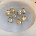 French Light Luxury Irregular Baroque Faux Pearl Stud Earrings For Women Vintage Geometric Round Design view 1