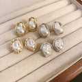 French Light Luxury Irregular Baroque Faux Pearl Stud Earrings For Women Vintage Geometric Round Design view 4